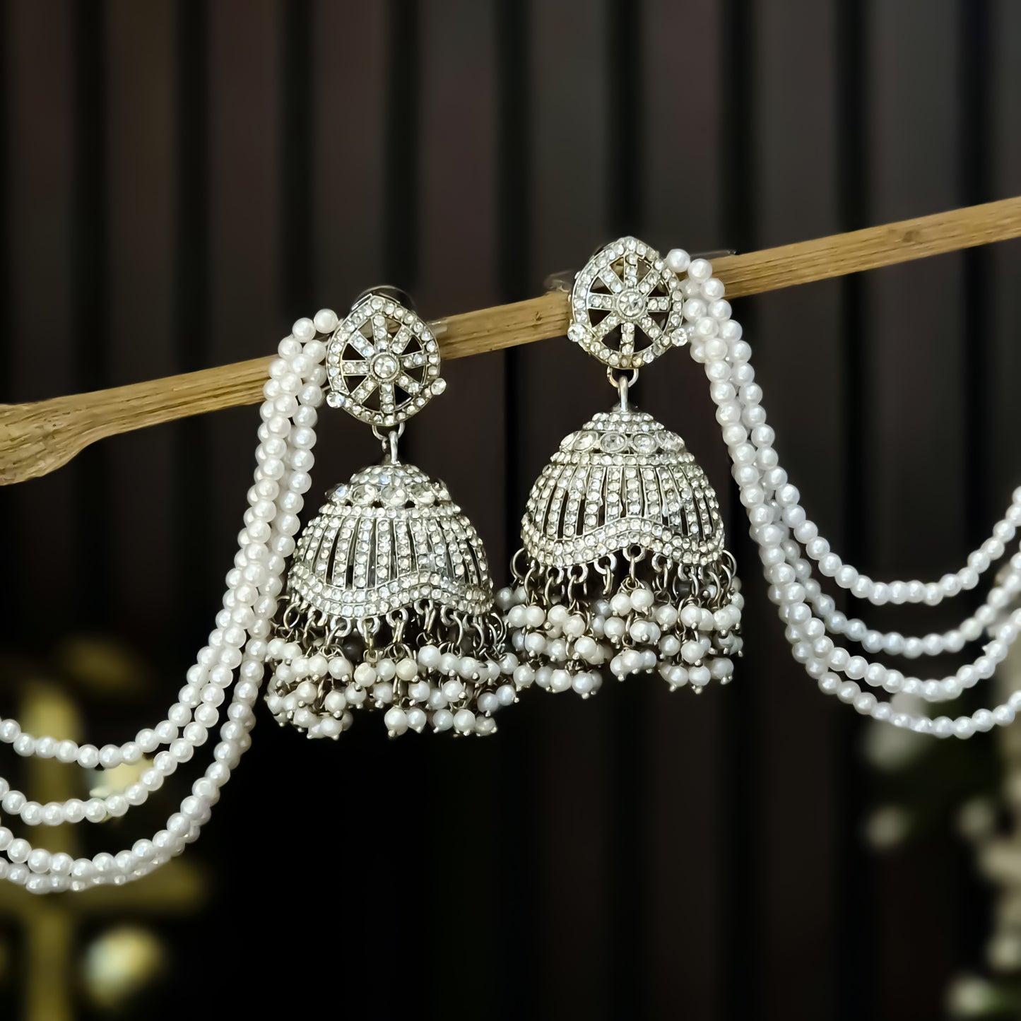 Sabrina Rhodium Reverse AD Jhumka Earrings with Earchain - Silver