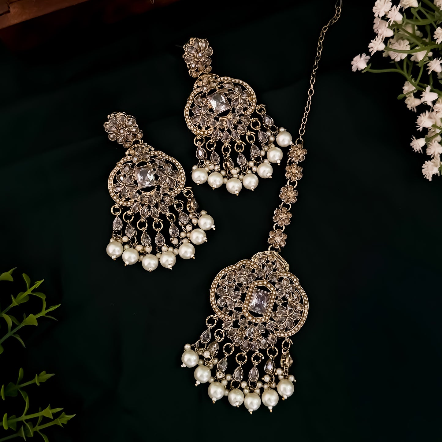Nihal Reverse AD Necklace Set with Earrings & Teeka - Golden