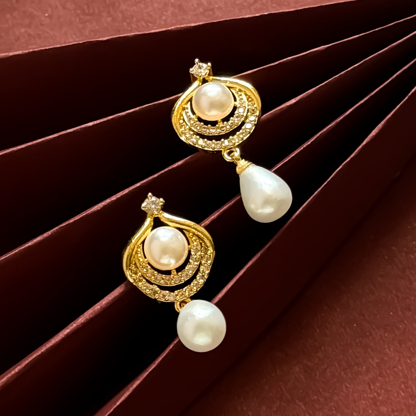 Alice American Diamond Pearl Drop Golden Stud Earrings