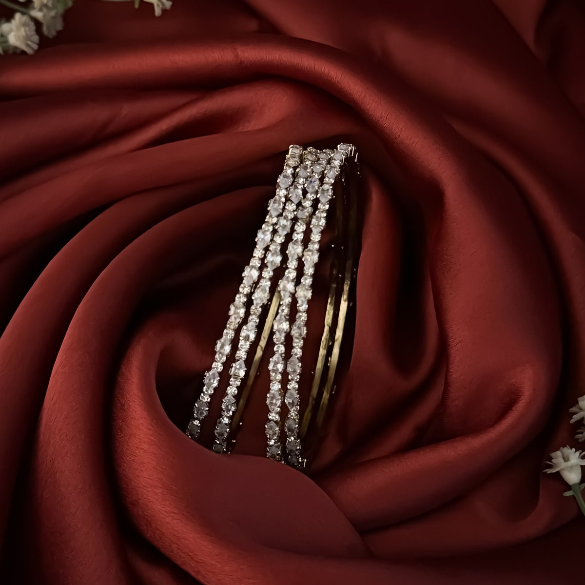 Golden Vedya Petals Premium AD Bangles (Set of 4)