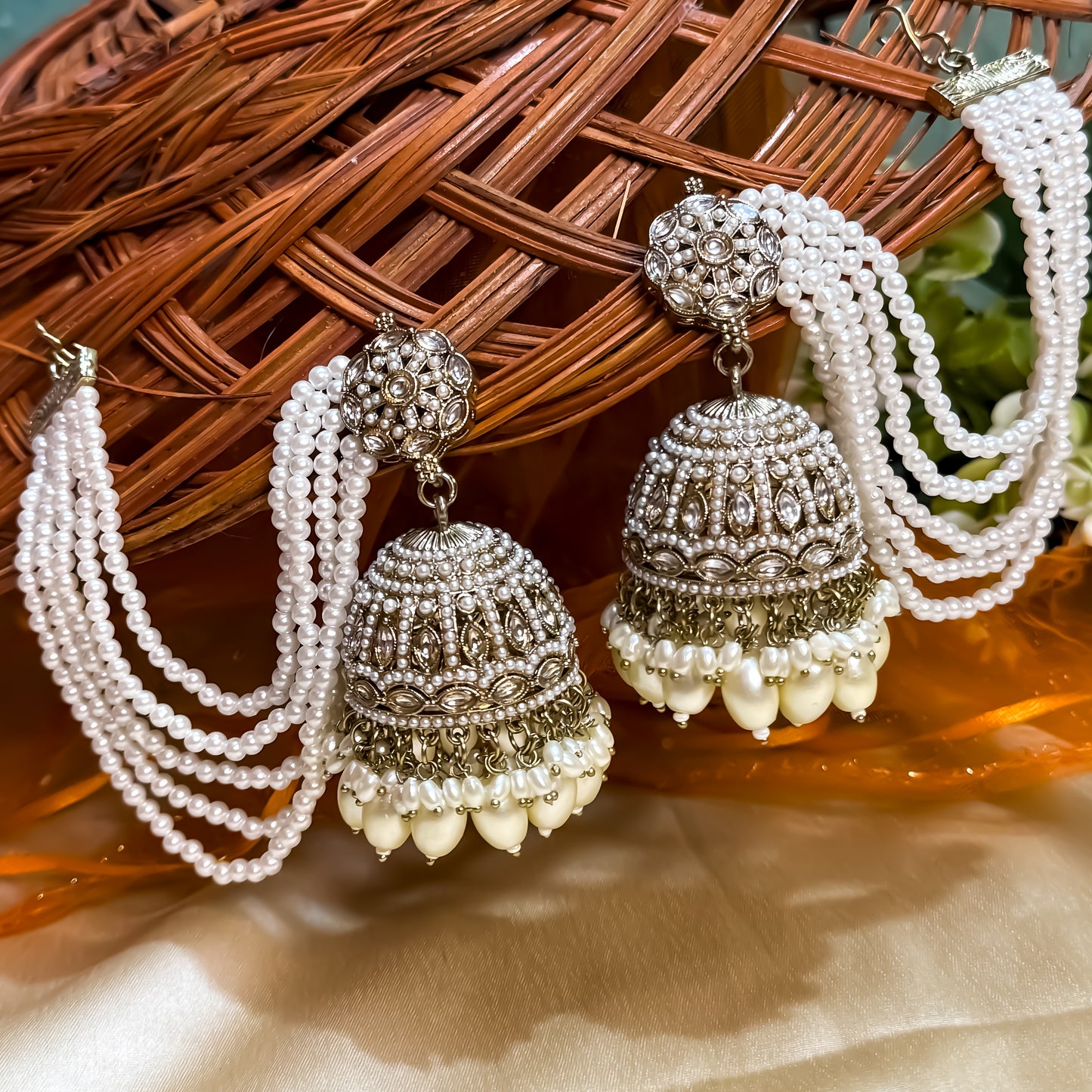 Traditional antique gold reverse american diamond bridal earrings featuring classic white pearls with cascading teardrop drops and pearl sahara support chains