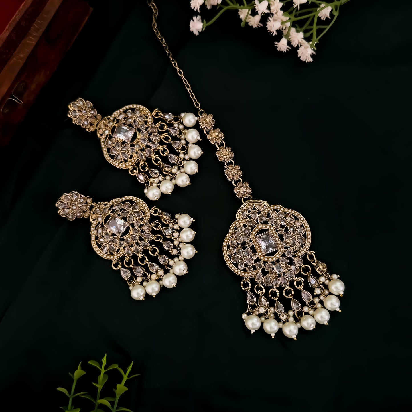Nihal Reverse AD Necklace Set with Earrings & Teeka - Golden