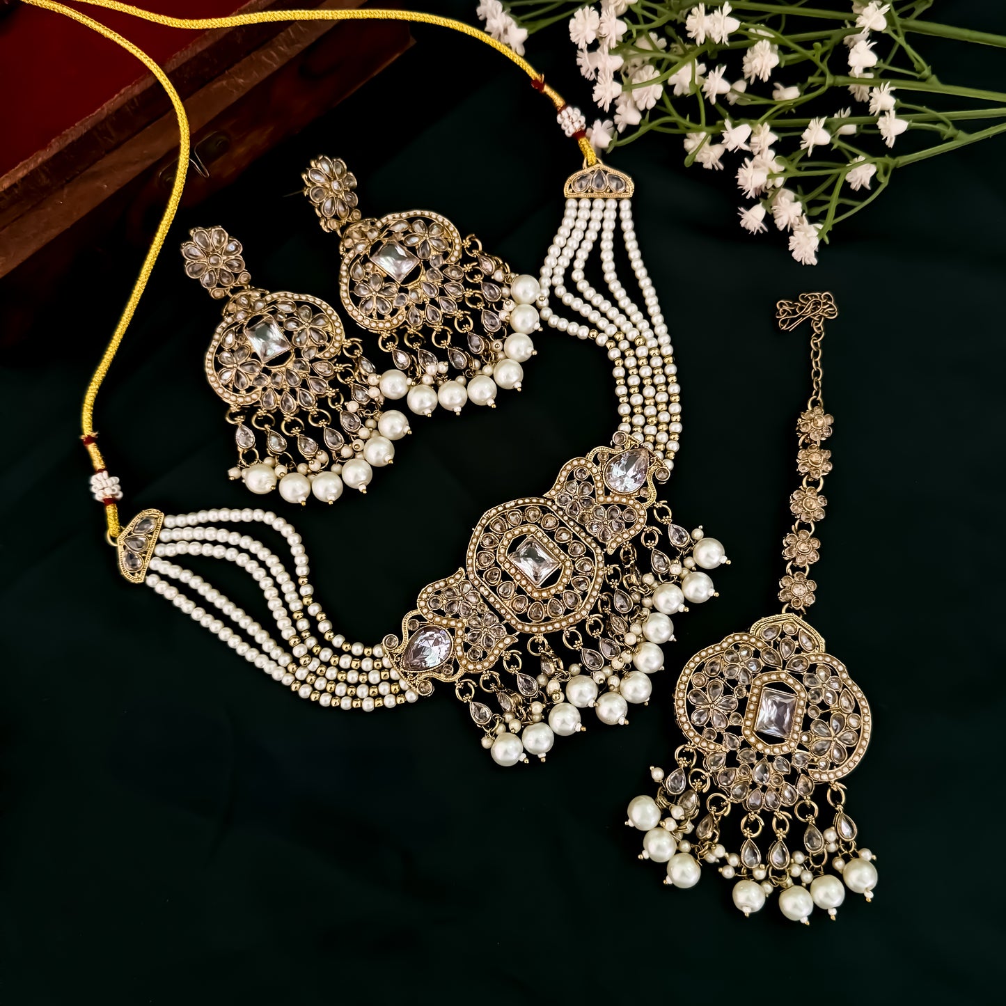 Nihal Reverse AD Necklace Set with Earrings & Teeka - Golden