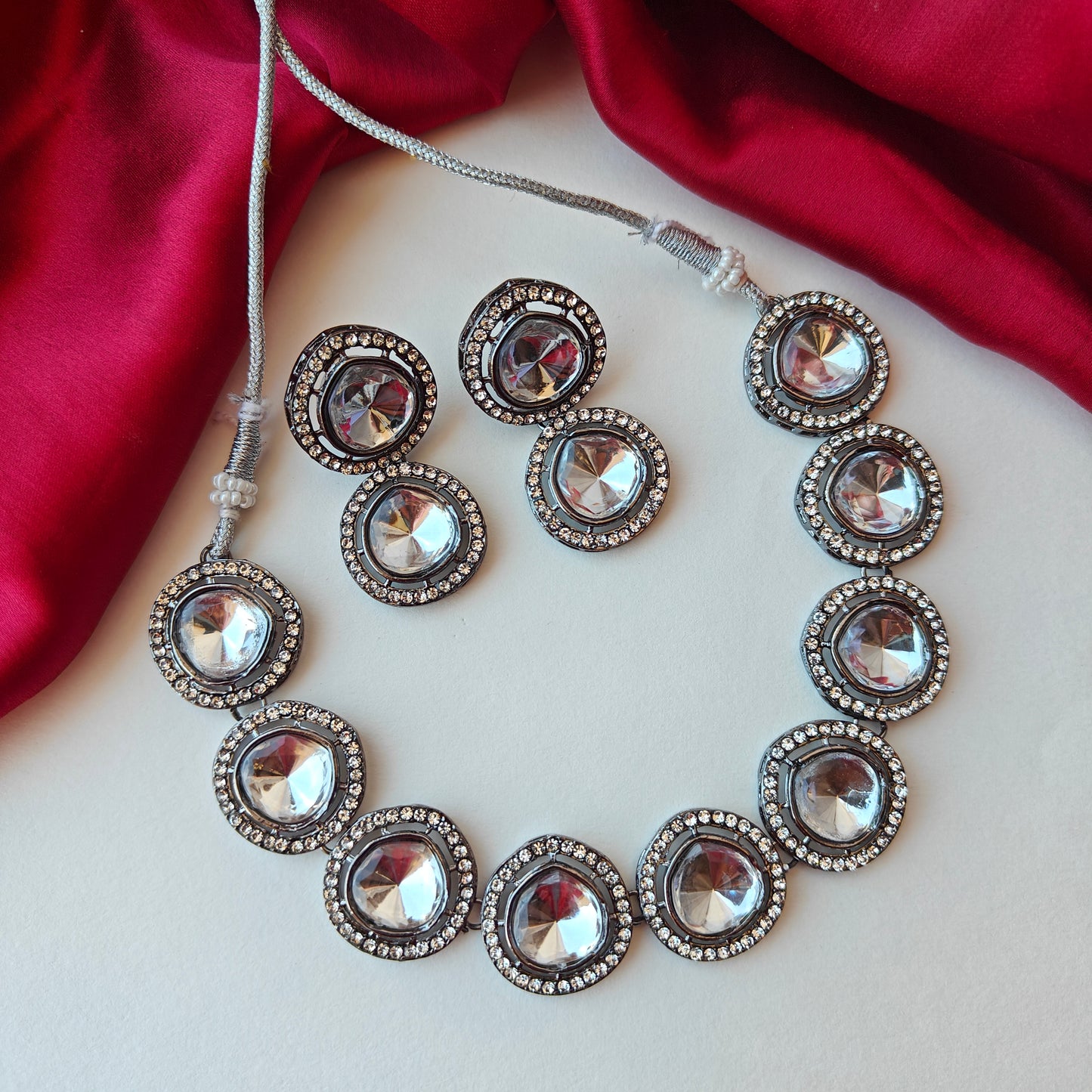 Vipasa Black Metal Polki Look Alike Necklace Set with Earrings