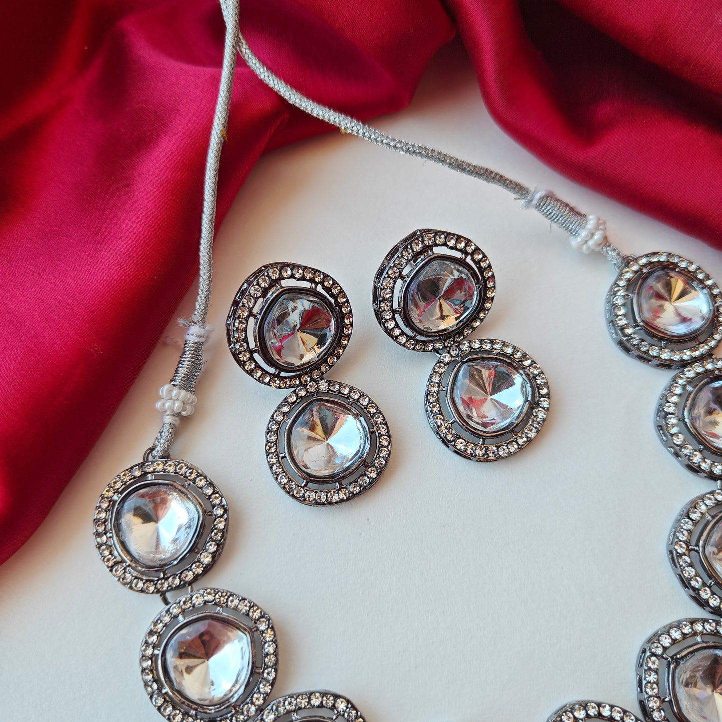 Vipasa Black Metal Polki Look Alike Necklace Set with Earrings