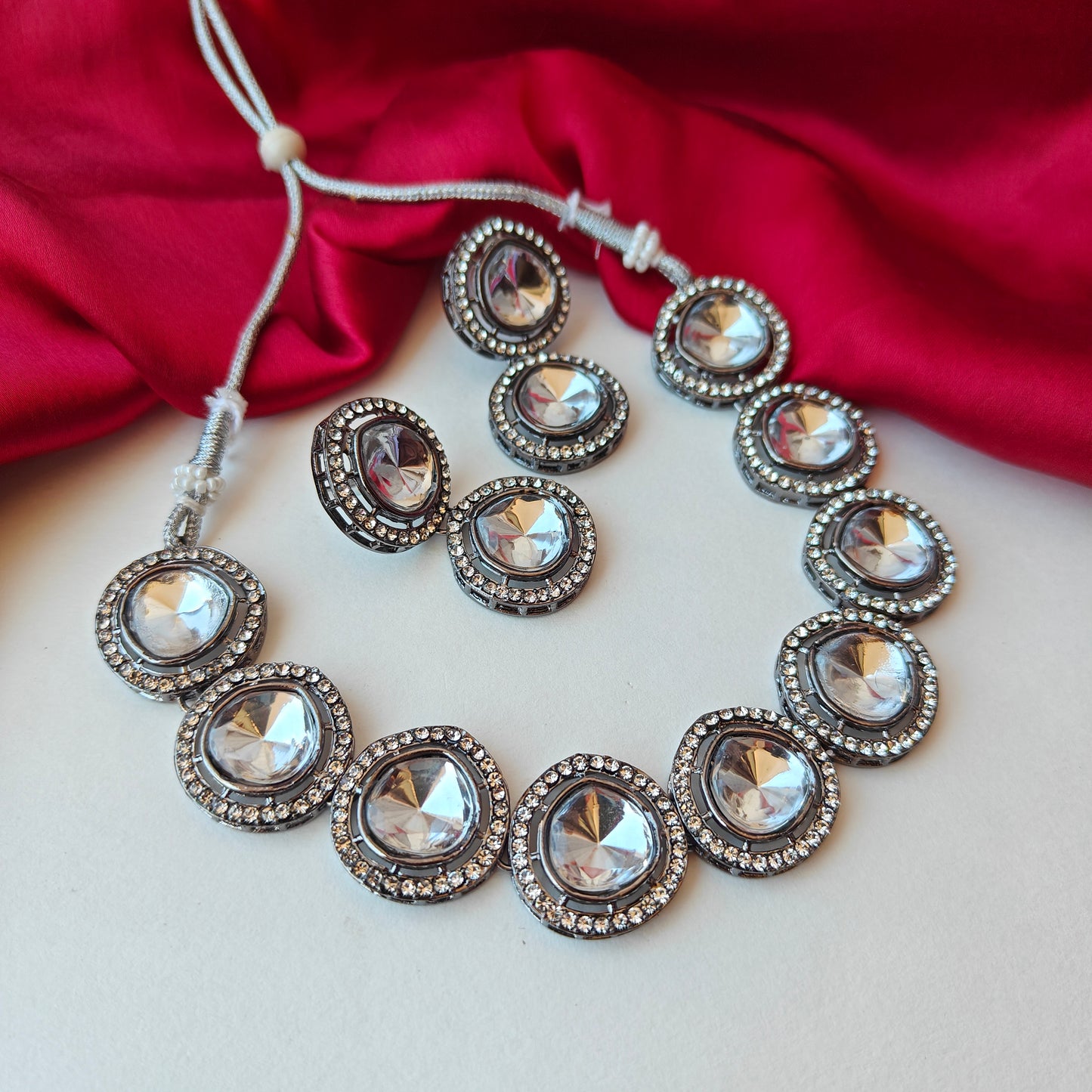 Vipasa Black Metal Polki Look Alike Necklace Set with Earrings