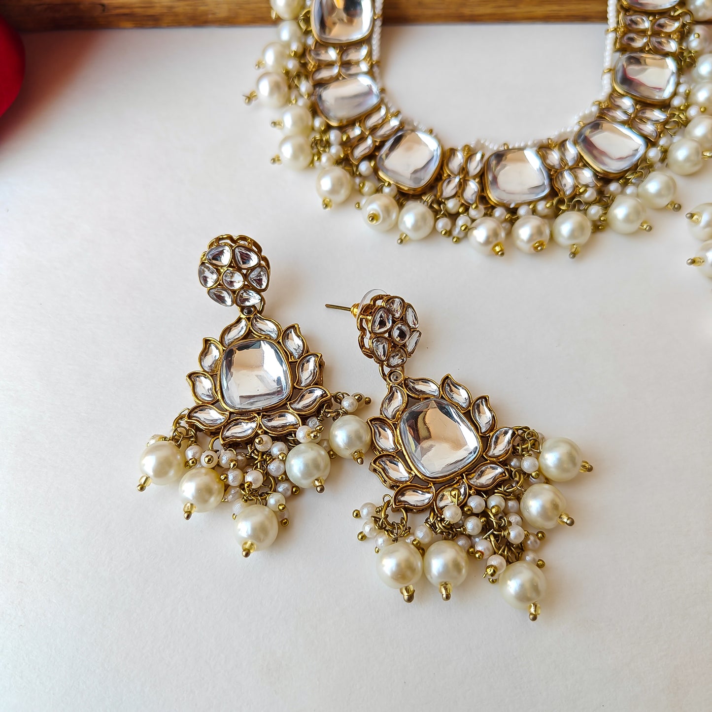 Rajvi Kundan Necklace Set with Earrings & Tika