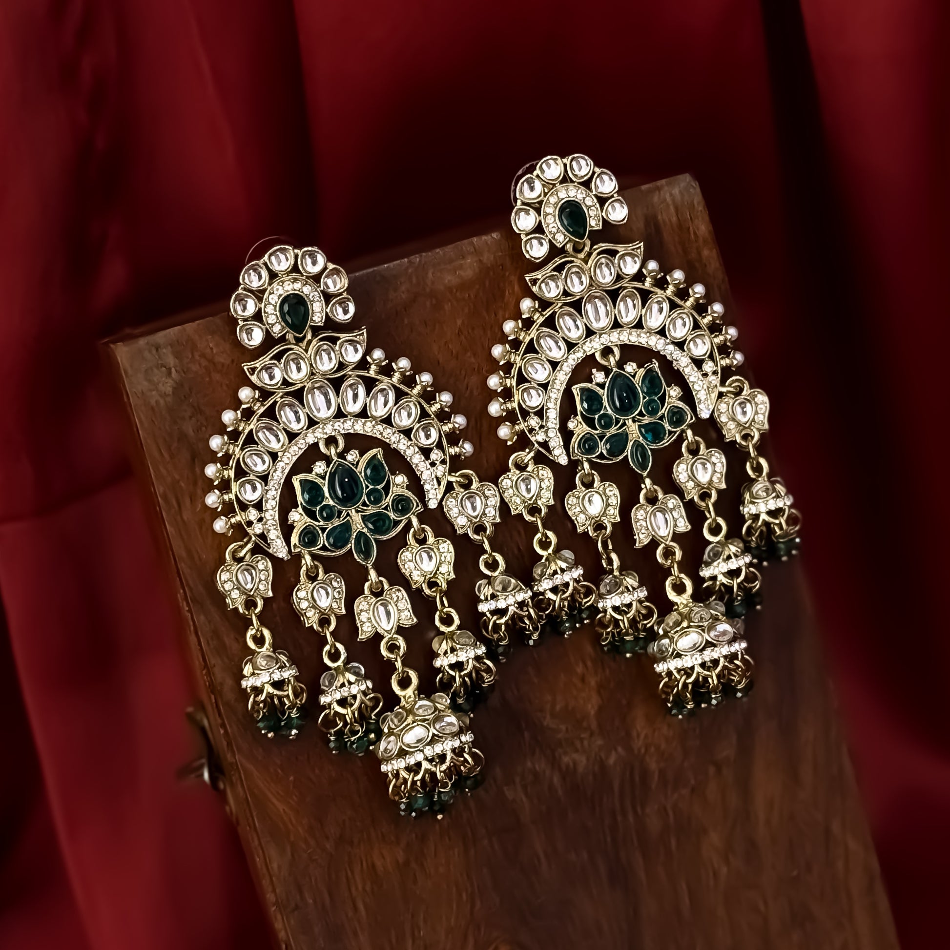 Hina Khan inspired oversized antique gold hybrid chandbali jhumka earrings featuring emerald green lotus kundan work and hanging green beads