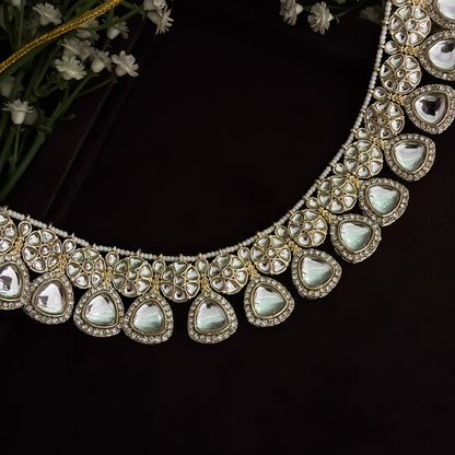 Hemakshi Golden Kundan Neckalce Set with Earrings & Teeka