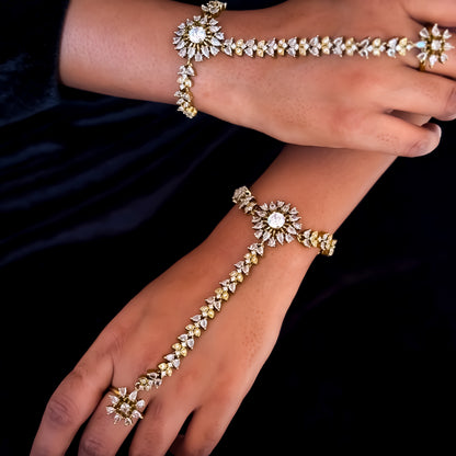 Christine premium american diamond haathphool piece featuring crystal chevron links and a round sunburst cz centerpiece on a matte gold finish