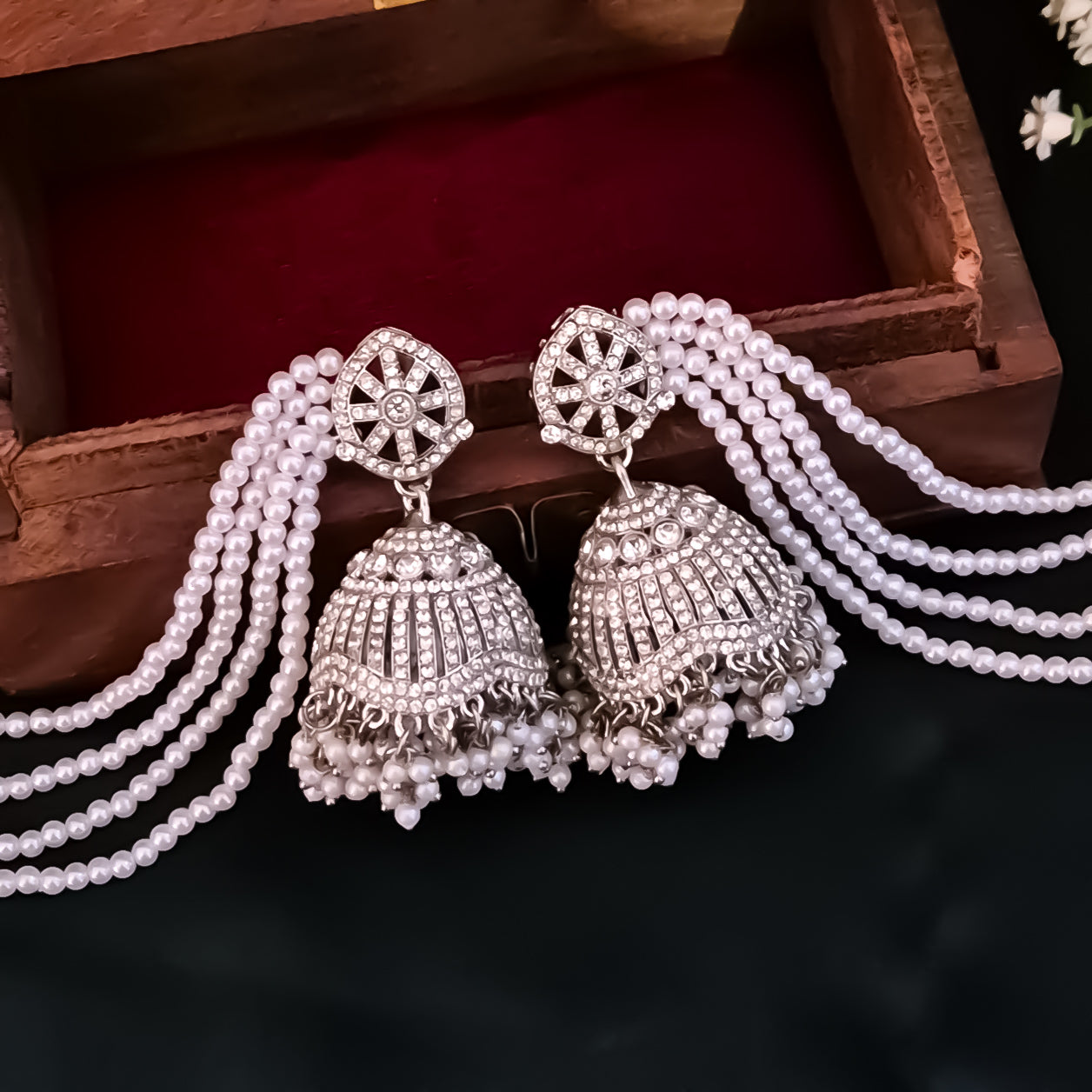 Sabrina Rhodium Reverse AD Jhumka Earrings with Earchain - Silver