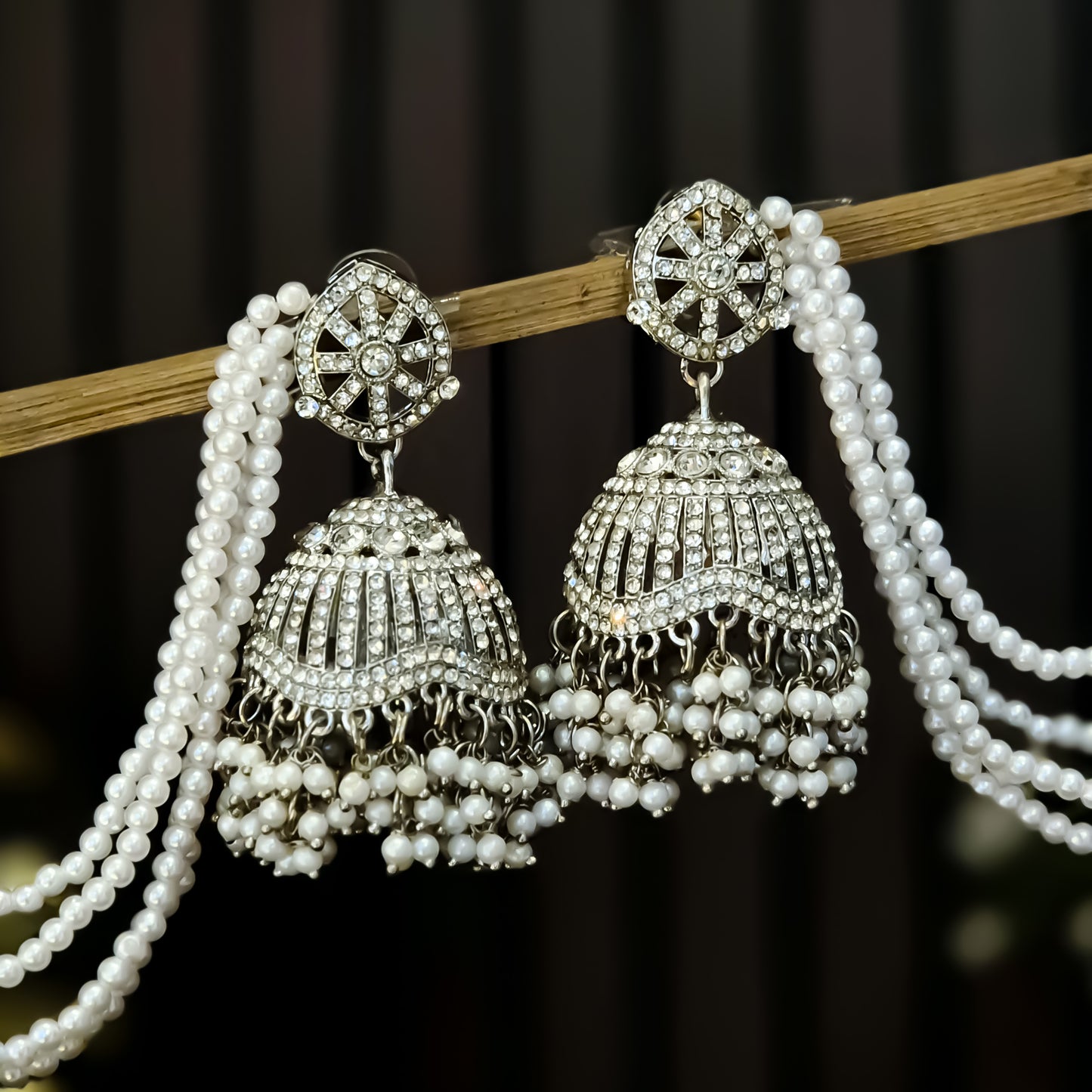 Sabrina Rhodium Reverse AD Jhumka Earrings with Earchain - Silver