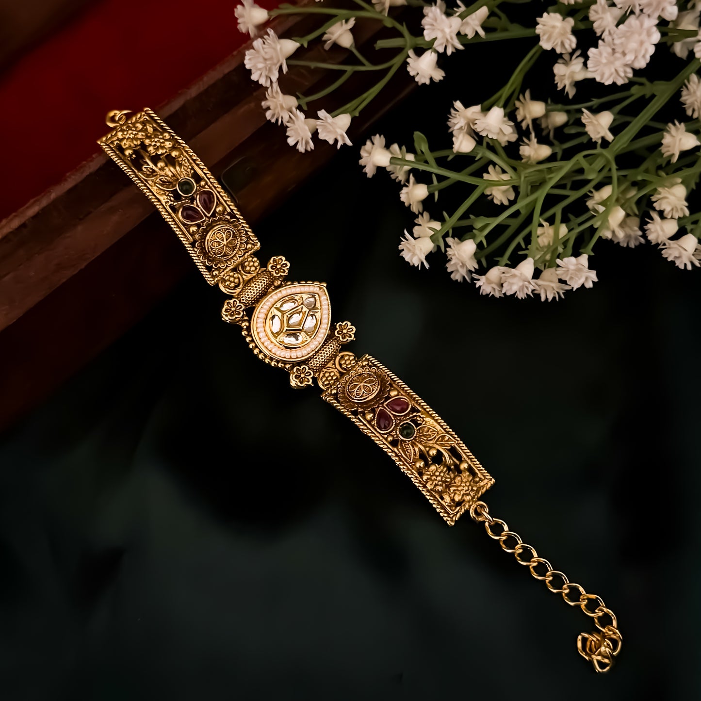 Ranjana rajwadi adjustable antique gold bracelet featuring a teardrop kundan center medallion and intricate floral side panels