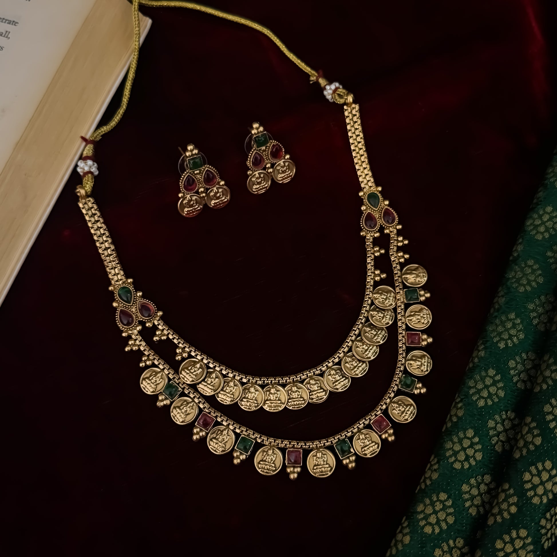 Padma premium antique gold temple kasu mala necklace set featuring double rows of sculpted goddess lakshmi coins pink and green stones with matching earrings