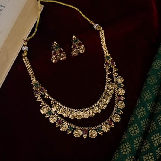 Padma premium antique gold temple kasu mala necklace set featuring double rows of sculpted goddess lakshmi coins pink and green stones with matching earrings
