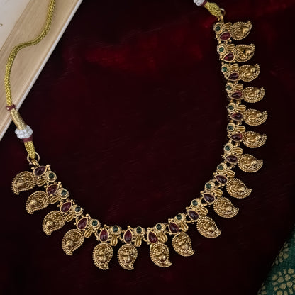Amrapali leaf Temple gold temple choker necklace set featuring a continuous linked row of paisley manga medallions with alternating pink and green kemp stones alongside matching paisley drop earrings