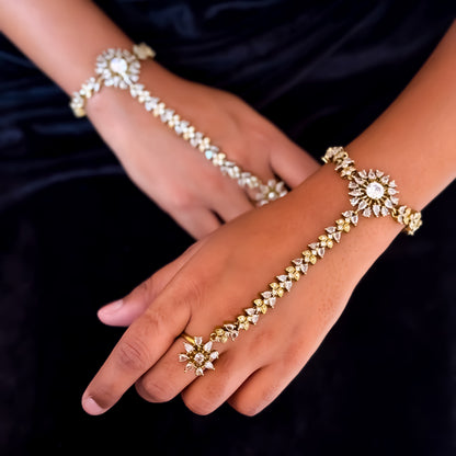 Christine premium american diamond haathphool piece featuring crystal chevron links and a round sunburst cz centerpiece on a matte gold finish