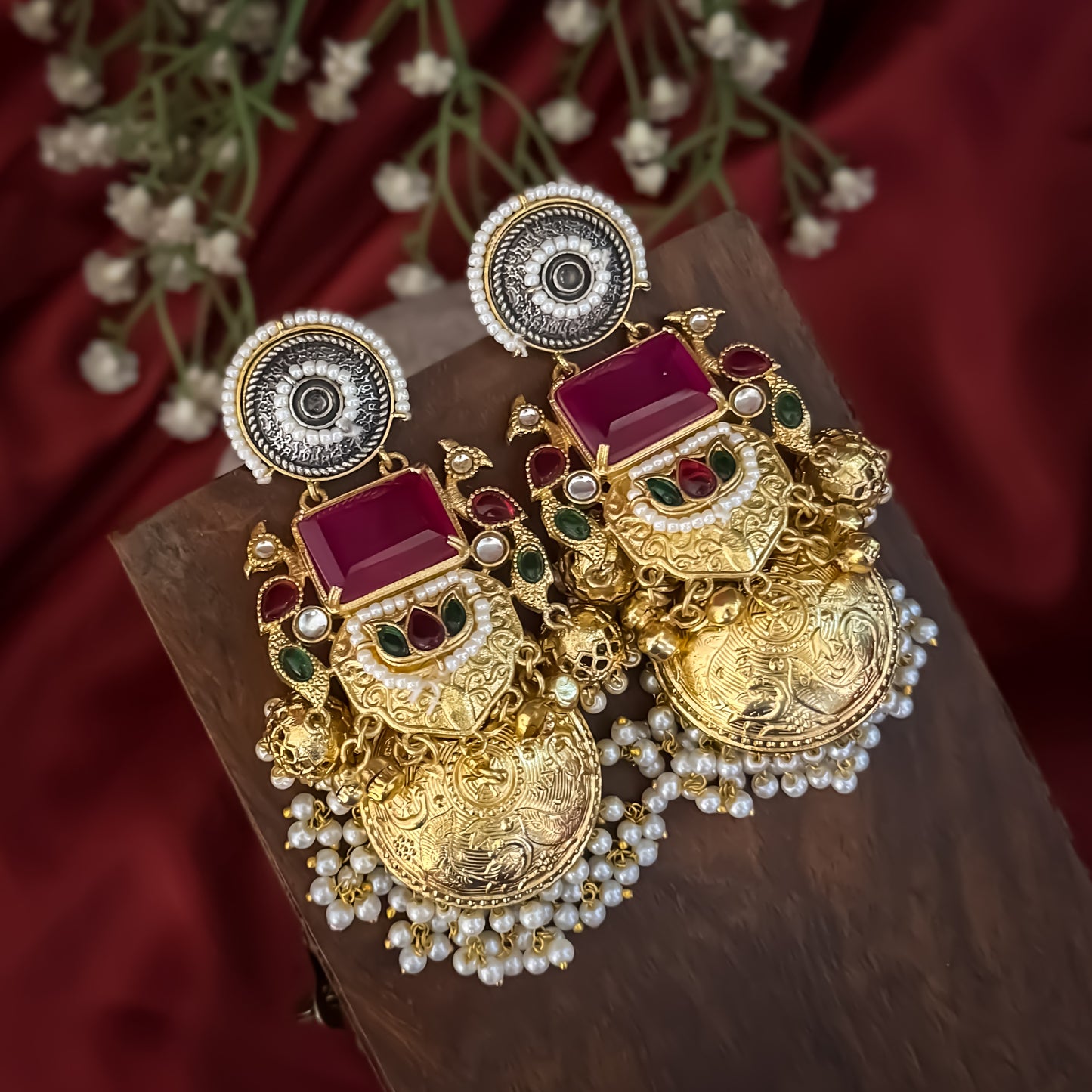 Roshni premium antique gold kashmiri earrings featuring dual tone oxidized silver chakra studs a large rectangular magenta quartz gemstone shield a kemp stone peacock link and multiple jhumka domes with dense micro pearl fringes