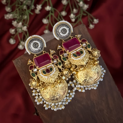Roshni premium antique gold kashmiri earrings featuring dual tone oxidized silver chakra studs a large rectangular magenta quartz gemstone shield a kemp stone peacock link and multiple jhumka domes with dense micro pearl fringes