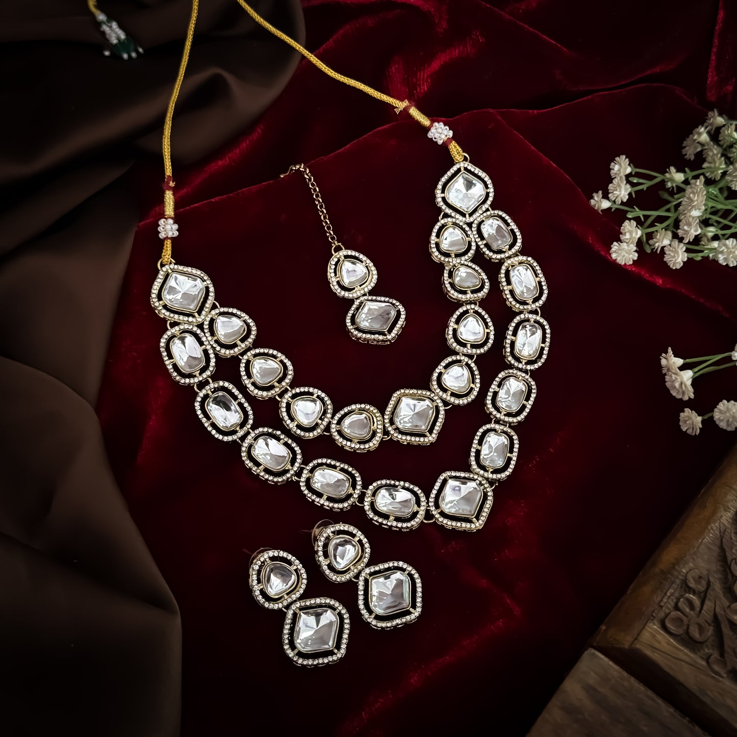 Gulnaj premium double layer golden zircon kundan necklace set featuring clear square and oval stones with micro zircon halos matching earrings and maang tikka