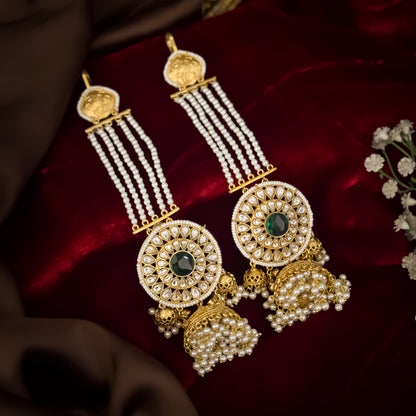 Raanisa premium antique gold kashmiri jhumka earrings featuring five strand pearl ear chains large circular kundan wheel medallion with green center stone and cluster pearl drops