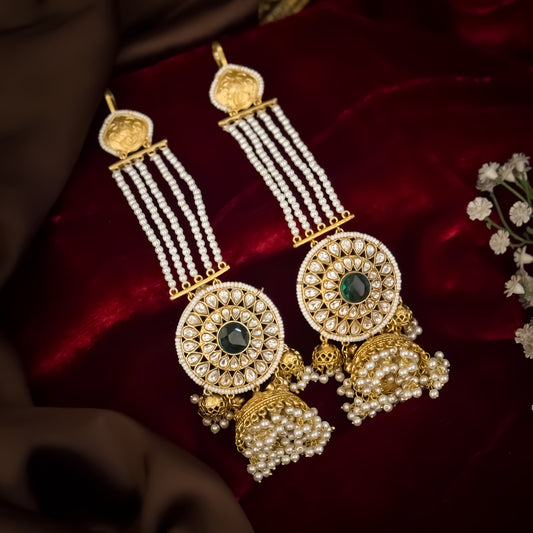 Raanisa premium antique gold kashmiri jhumka earrings featuring five strand pearl ear chains large circular kundan wheel medallion with green center stone and cluster pearl drops