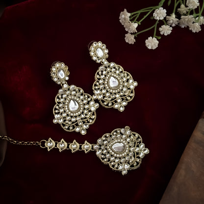Golden Vanshika premium zircon kundan necklace set featuring oval stone links floral clusters large shield pendant matching earrings and maang tikka