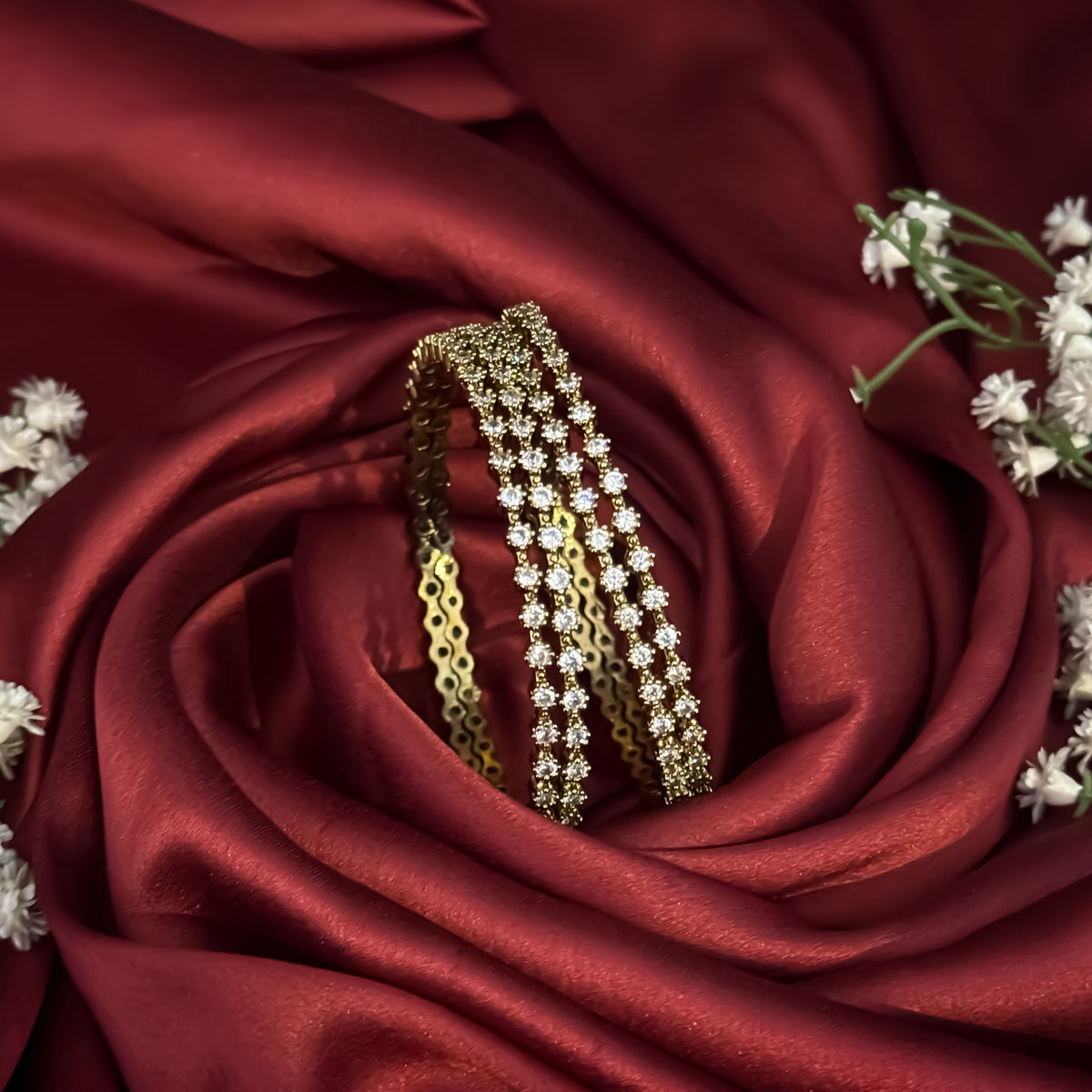 Stardust Premium AD Bangles Golden (Set of 4)