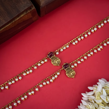 Floral Temple premium antique gold anklet pair featuring flexible double strand woven chain bands linked circular ruby pink and green kemp stone rosettes and cascading gold ghungroo fringes