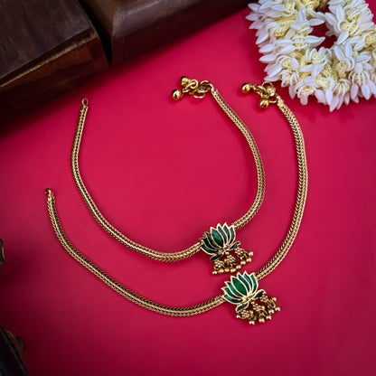 Lotus Bairagi premium antique gold temple anklet pair featuring flexible double strand woven rope chains a hand painted pink meenakari lotus flower centerpiece and dangling gold ghungroo bell clusters