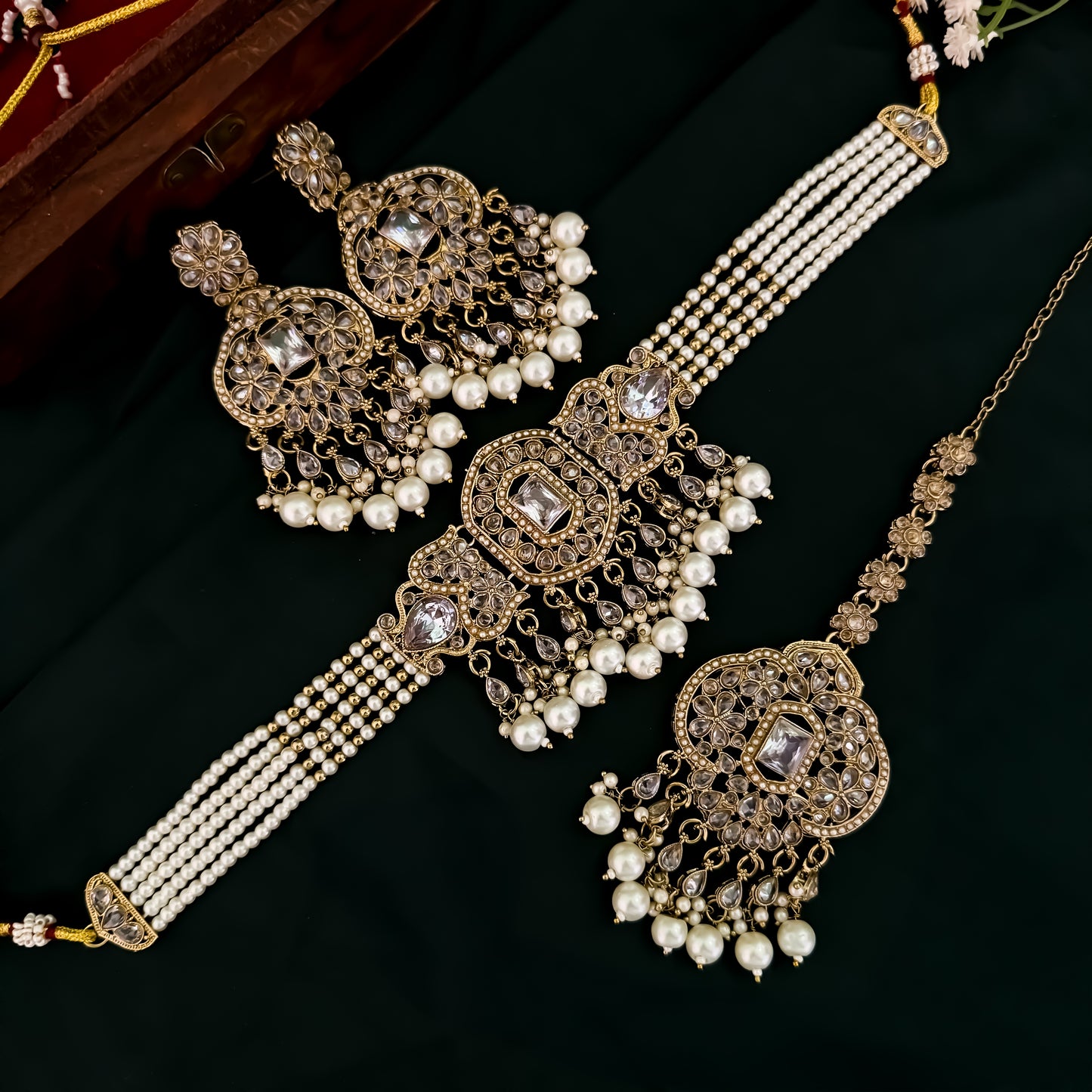 Nihal Reverse AD Necklace Set with Earrings & Teeka - Golden