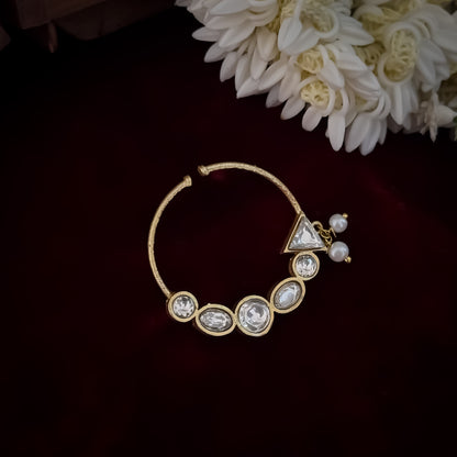 Shreya premium antique gold kundan nose clip nath featuring a non pierced hoop encrusted with a crescent arch of multi shape clear dabi stones a triangular tip and two swinging white pearls