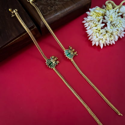 Lotus Bairagi premium antique gold temple anklet pair featuring flexible double strand woven rope chains a hand painted pink meenakari lotus flower centerpiece and dangling gold ghungroo bell clusters