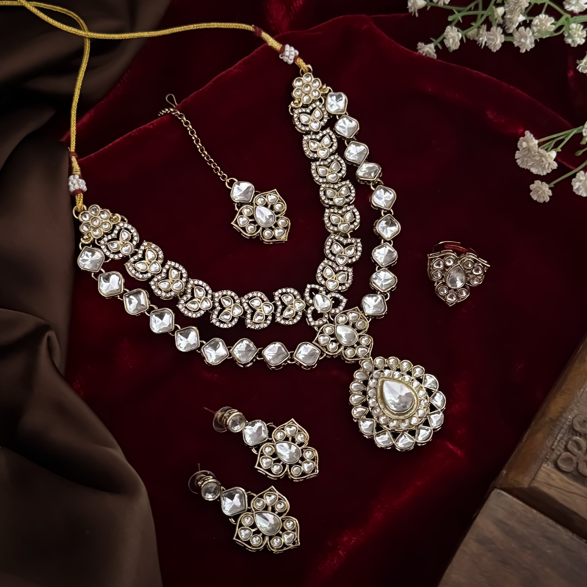 Jubair premium double layer golden zircon kundan necklace set featuring clear square and teardrop stones large pendant matching earrings maang tikka and ring