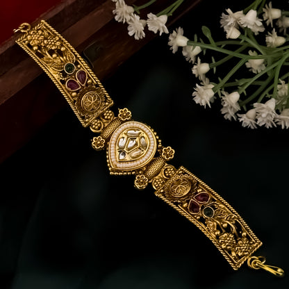 Ranjana rajwadi adjustable antique gold bracelet featuring a teardrop kundan center medallion and intricate floral side panels