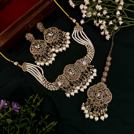 Nihal Reverse AD Necklace Set with Earrings & Teeka - Golden