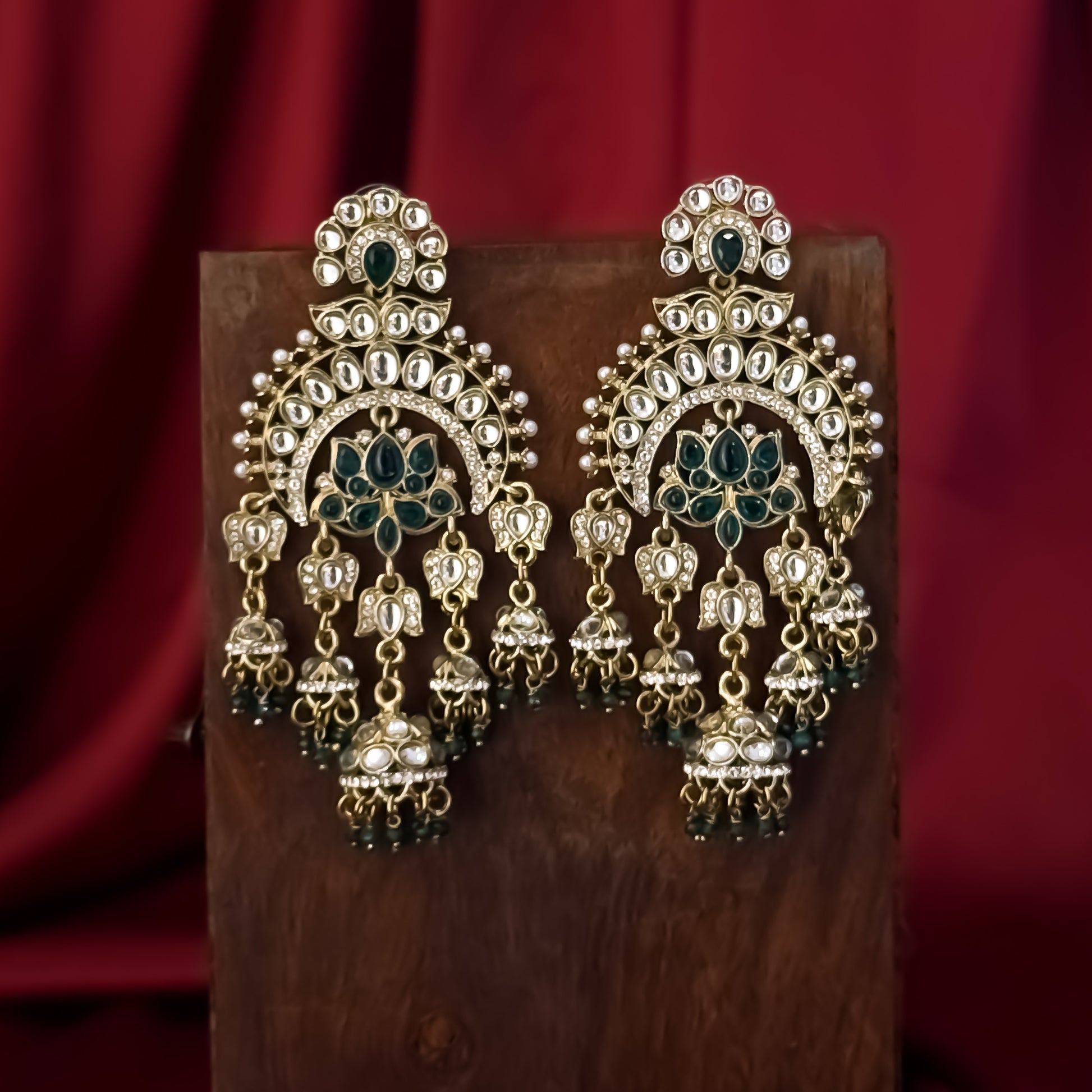 Hina Khan inspired oversized antique gold hybrid chandbali jhumka earrings featuring emerald green lotus kundan work and hanging green beads