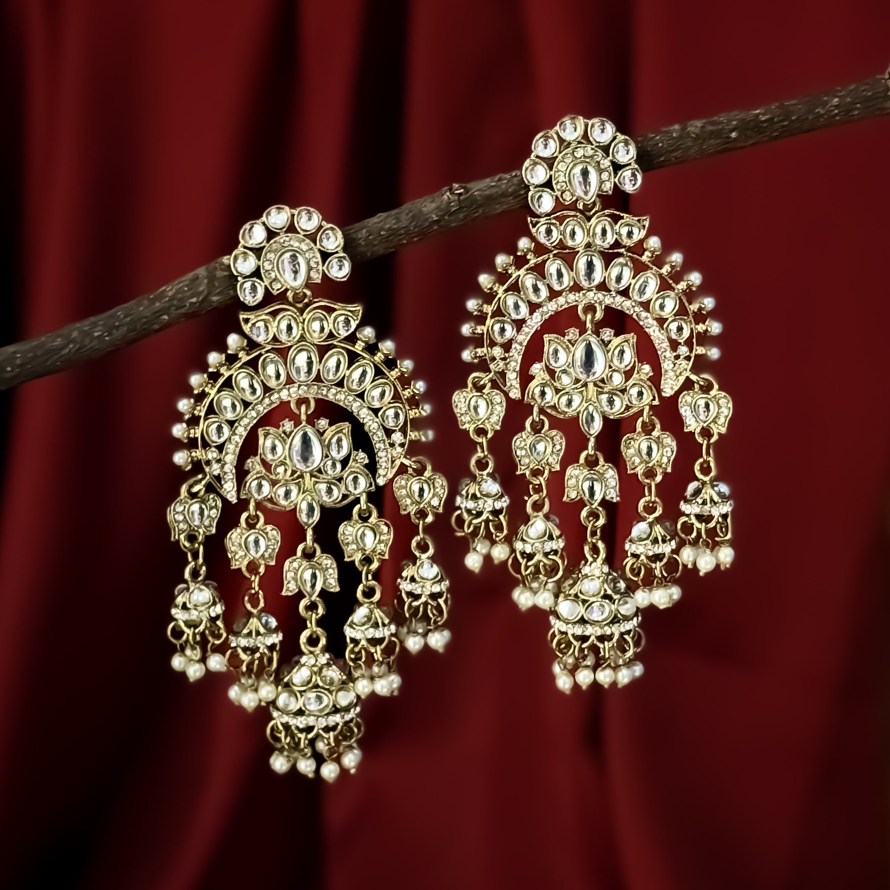 Hina Khan inspired oversized antique gold hybrid chandbali jhumka earrings featuring lotus kundan work and cascading pearl drops