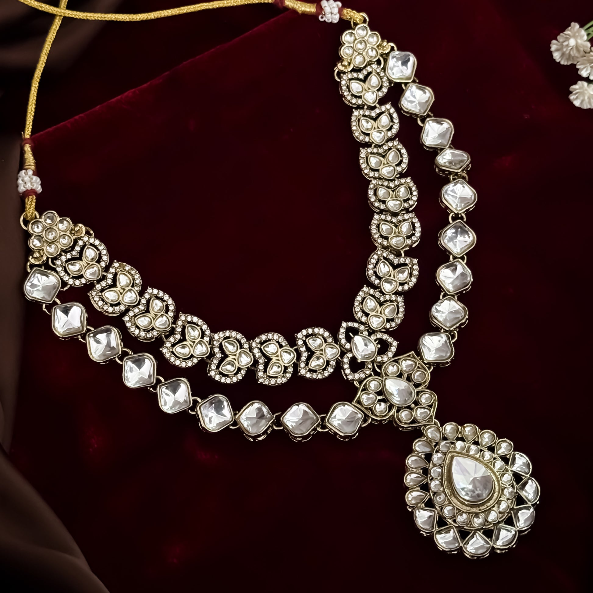Jubair premium double layer golden zircon kundan necklace set featuring clear square and teardrop stones large pendant matching earrings maang tikka and ring