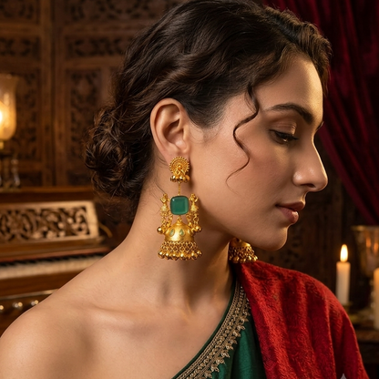 Baraat premium matte gold kashmiri earrings featuring circular rawa work studs a square cushion cut pastel green stone shield and a traditional floral relief dome jhumka cup with a dense gold bead fringe