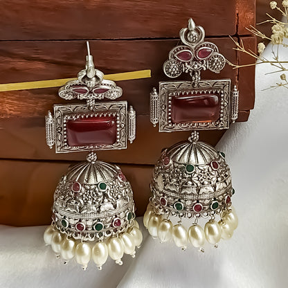 Shifat Silver Plated Brass Jhumka Earrings (Monalisa Stones)- Green & Red