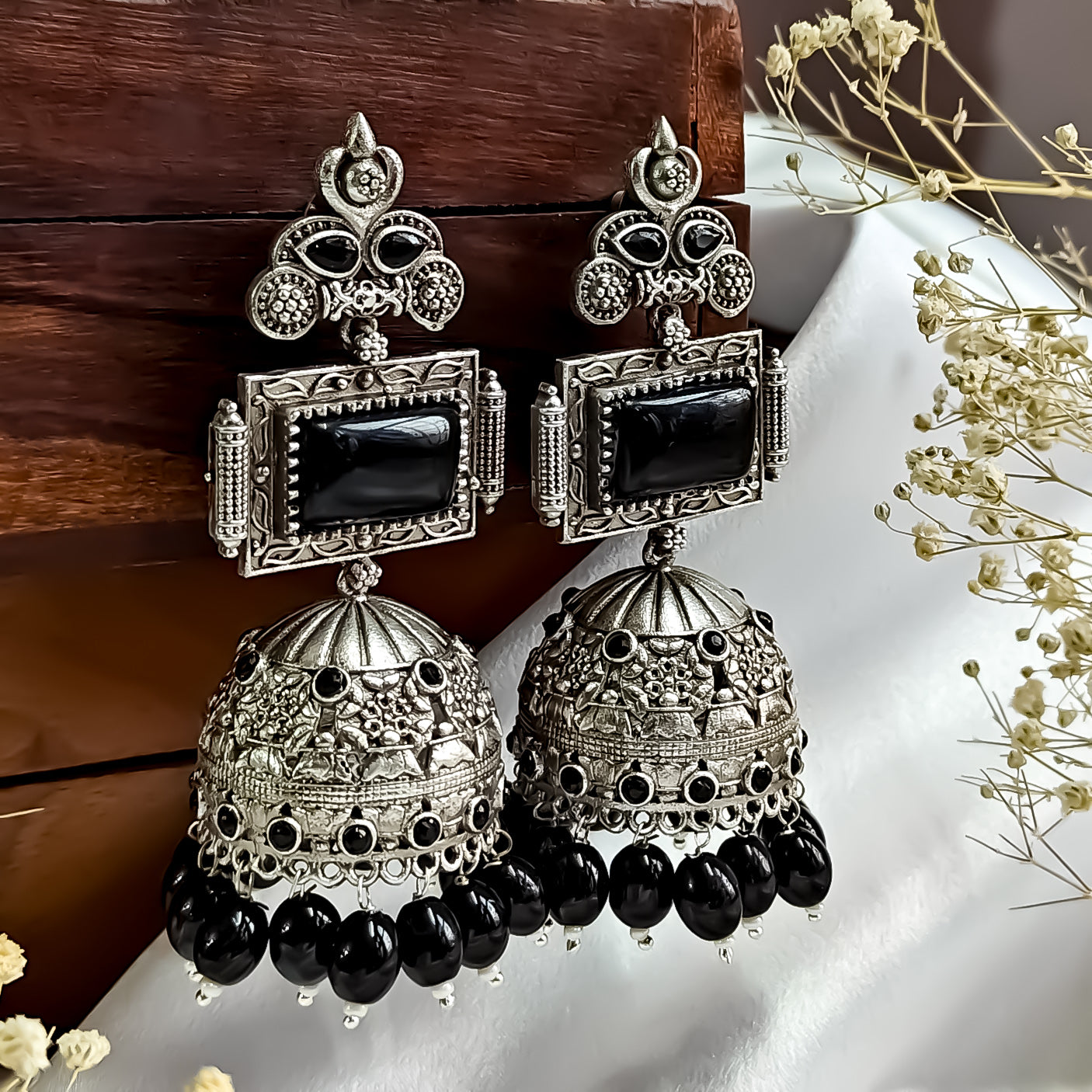 Shifat Silver Plated Brass Jhumka Earrings (Monalisa Stones)- Black