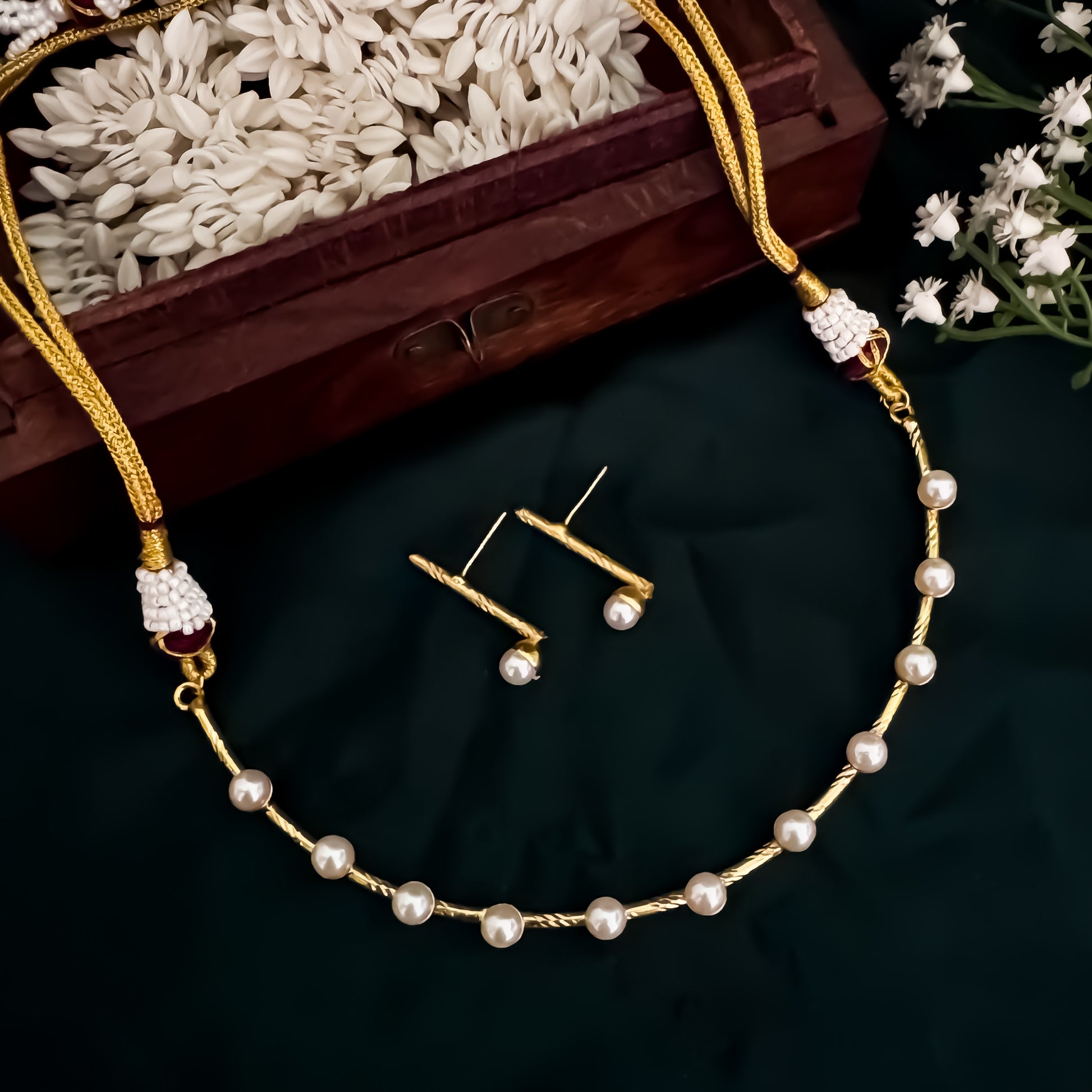Veera Pearl Golden Brass Hasli Necklace Set
