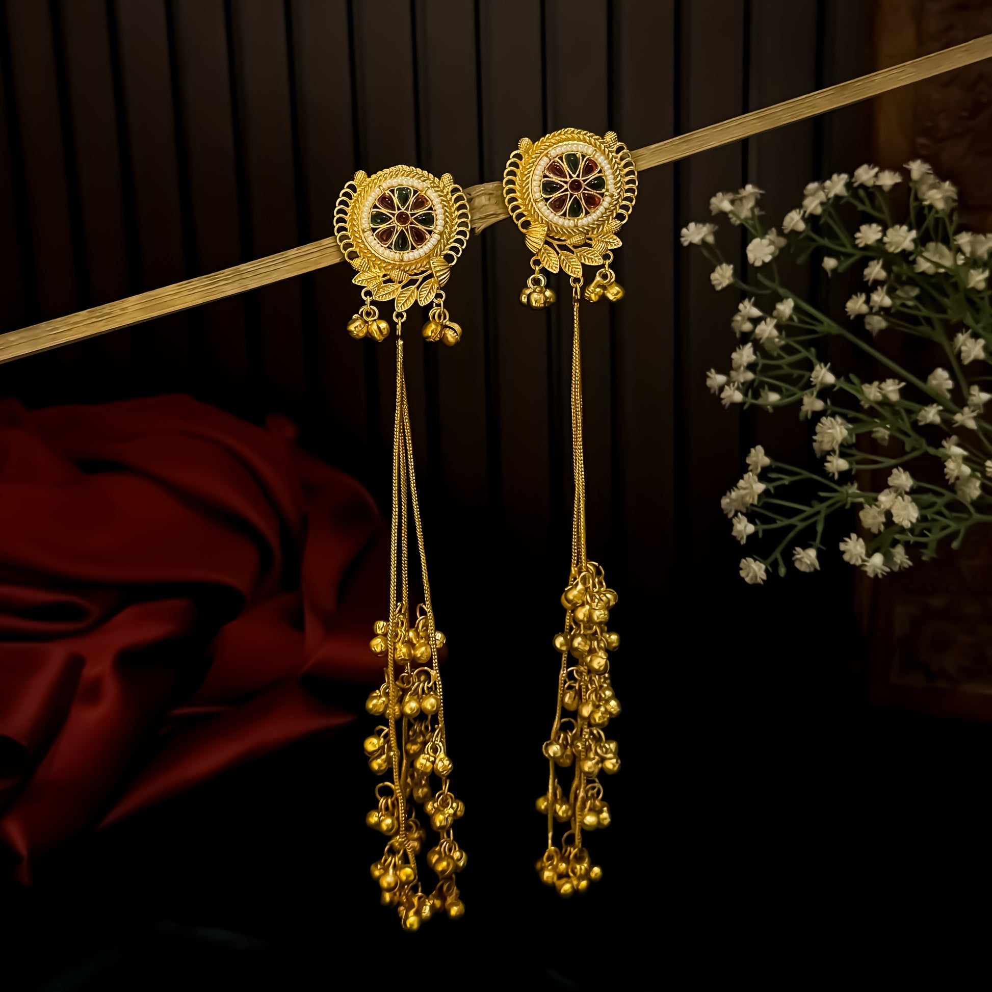 Unnati premium kashmiri brass dejhoor jhumka earrings featuring green enamel floral studs with white micro seed pearl borders and long cascading gold ghungroo chains