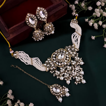 Mayuri Reverse AD Necklace Set with Earrings & Teeka - Golden