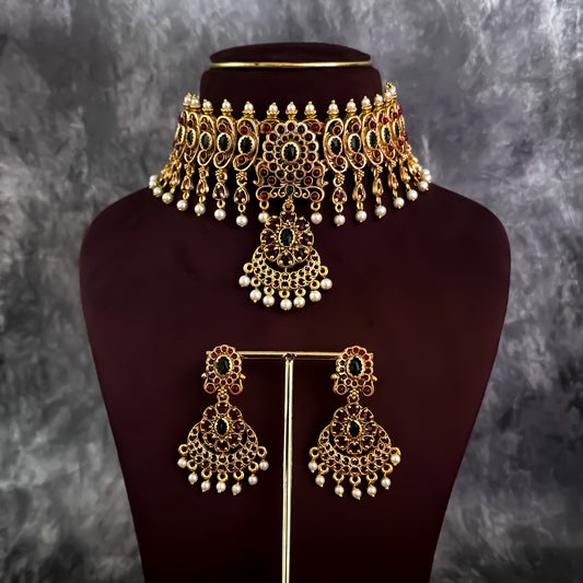 Kiana Temple Motif Necklace Set - Golden