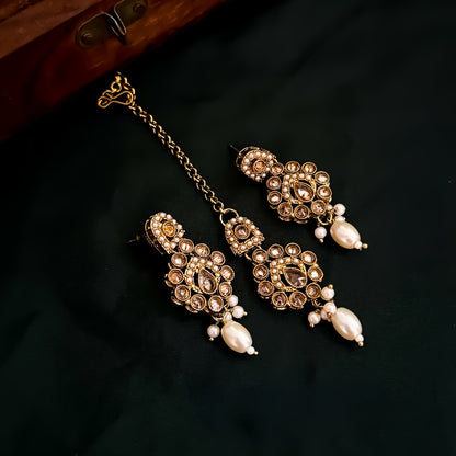 Mishka Jadau Reverse AD Sleek Golden Necklace Set with Earrings & Teeka