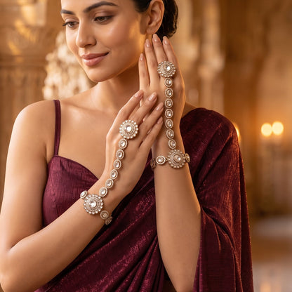 premium antique gold kundan haathphool pair featuring circular flower rosette rings linked vertical almond stone tracks and matching clear crystal wrist medallion bracelets
