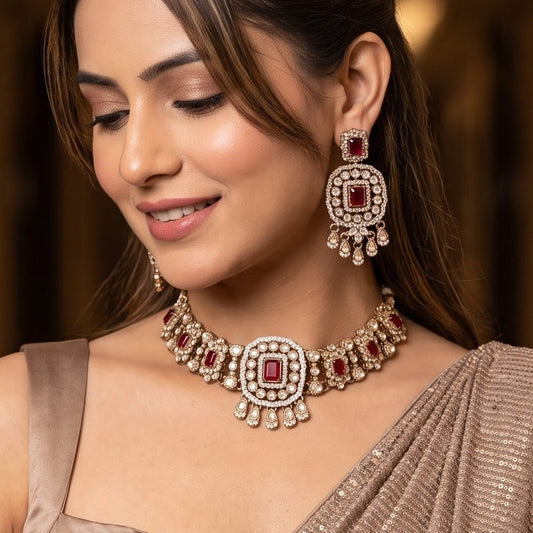 Ruhanika premium antique gold kundan broad choker necklace set featuring a segmented panel collar tracking of rectangular pastel pink quartz stones a large central rounded rectangular medallion matching tiered dropdown earrings