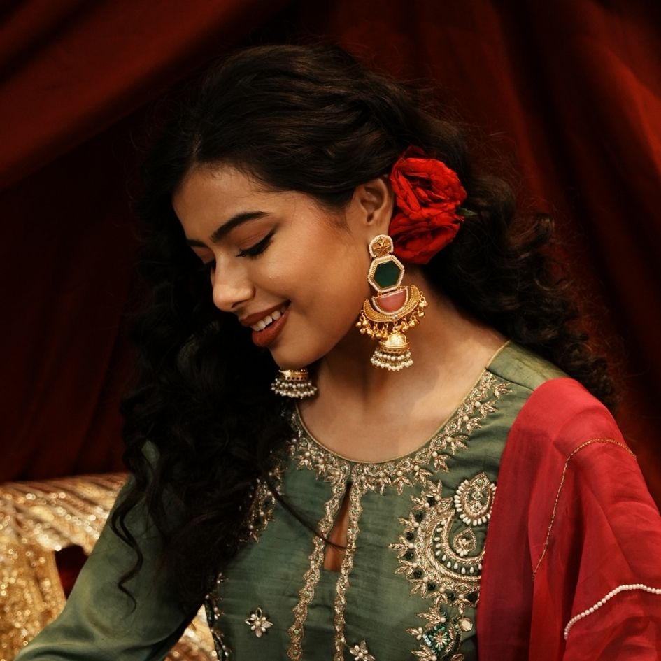 Kaviri premium antique brass kashmiri earrings featuring hexagonal mint green and crescent pink stones with double pearl borders hanging ghunghroos and a pearl jhumka drop
